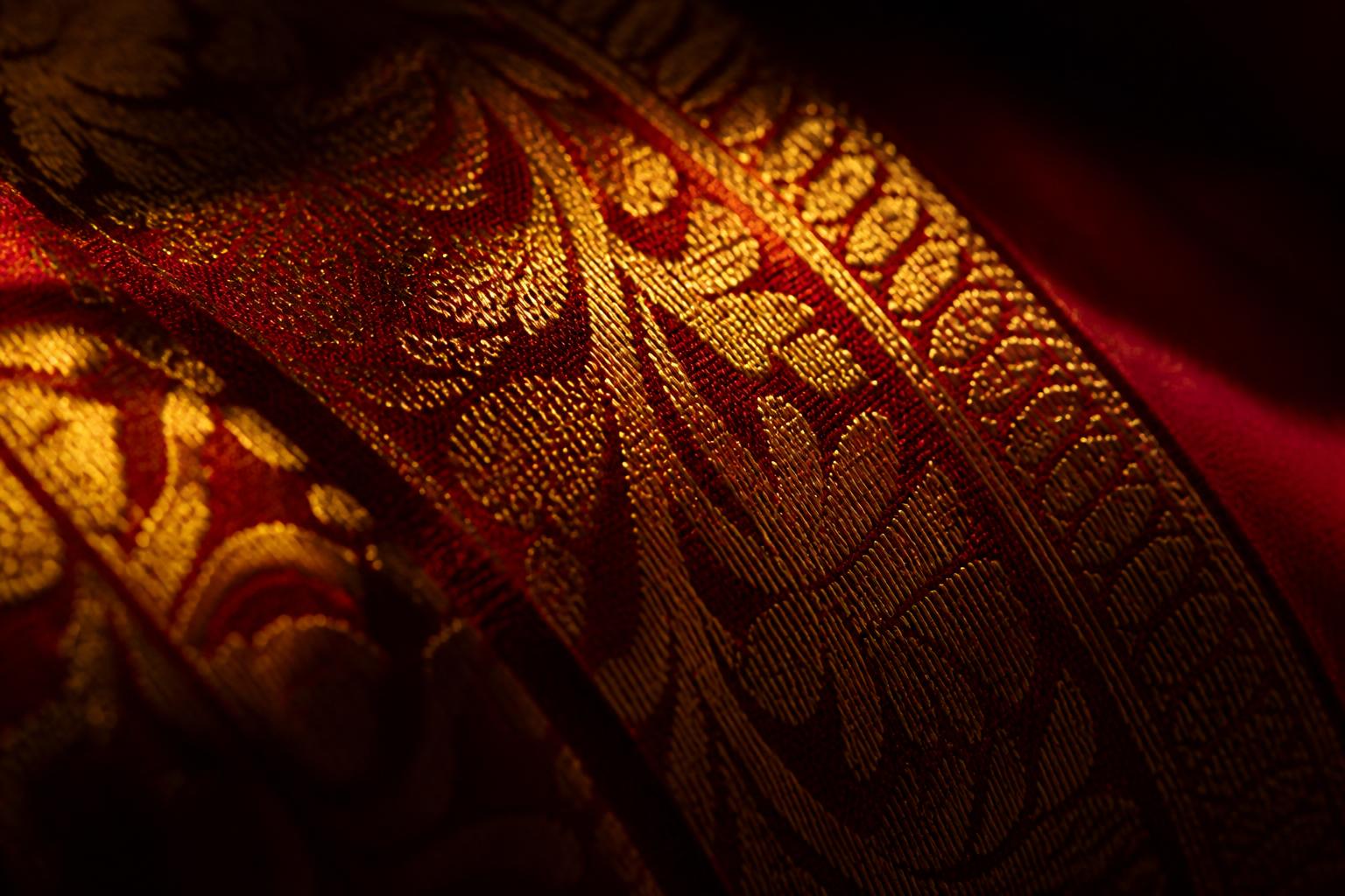 Golden zari threads catching the light